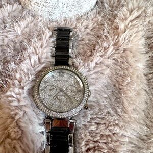 Silver stone and black Michael lots watch you need to add battery
